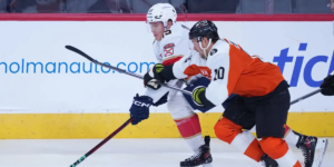 Lundell and Bobby Brink battle for the puck - Florida Panthers vs. Philadelphia Flyers