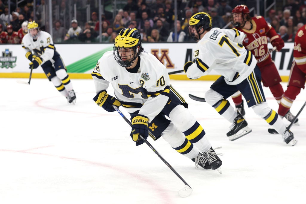 Matty Beniers #10 of the Michigan Wolverines skates against the Denver Pioneers during the Frozen Four semifinal game. (Maddie Meyer/Getty Images)