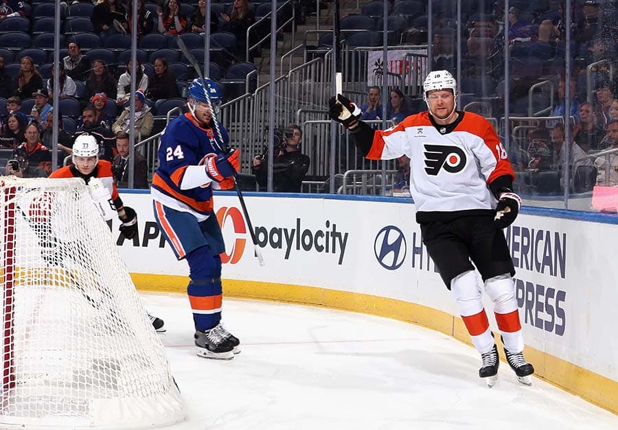 ELMONT, NEW YORK - SEPTEMBER 21: Rodrigo Abols #18 of the Philadelphia Flyers celebrates his first period goal against the New York Islanders in a preseason game at UBS Arena on September 21, 2025 in Elmont, New York.