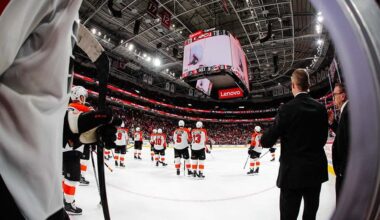 RALEIGH, NORTH CAROLINA - OCTOBER 11: The Philadelphia Flyers await the ruling on a goal during the overtime period of the game against the Carolina Hurricanes at Lenovo Center on October 11, 2025 in Raleigh, North Carolina.