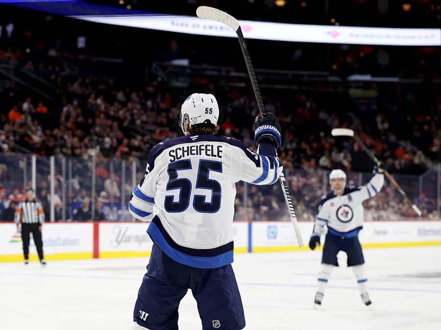 PHILADELPHIA, PENNSYLVANIA - OCTOBER 16: Mark Scheifele #55 of the Winnipeg Jets celebrates his goal during the third period against the Philadelphia Flyers at Xfinity Mobile Arena on October 16, 2025 in Philadelphia, Pennsylvania.