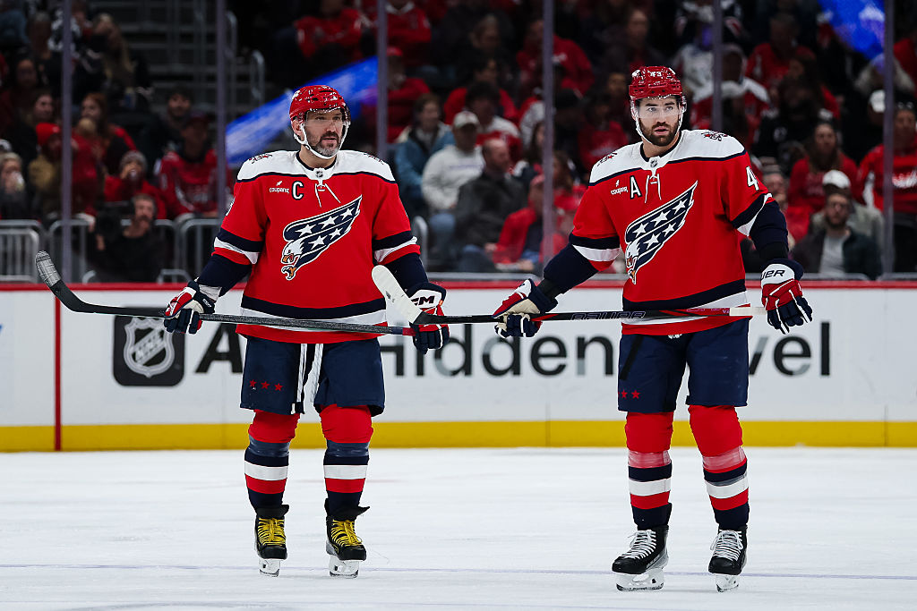 WASHINGTON, DC - OCTOBER 25: Alex Ovechkin #8 and Tom Wilson #43 of the Washington Capitals look on during the first period of the game against the Ottawa Senators at Capital One Arena on October 25, 2025 in Washington, DC. (Photo by Scott Taetsch/Getty Images)