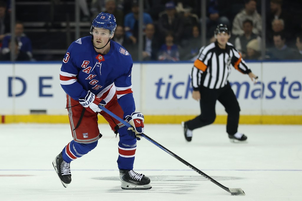 Alexis Lafrenière #13 of the New York Rangers in action during the game against the San Jose Sharks at Madison Square Garden on October 23, 2025.