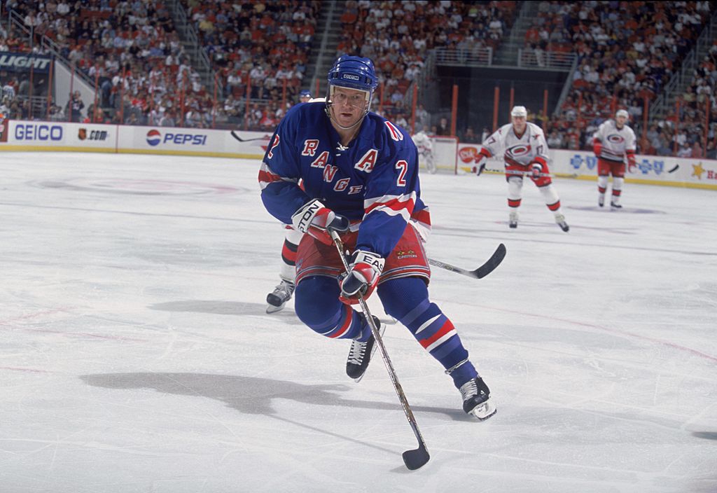 Brian Leetch #2 of the New York Rangers controls the puck during a game against the Carolina Hurricanes. (Kent Smith/Allsport)