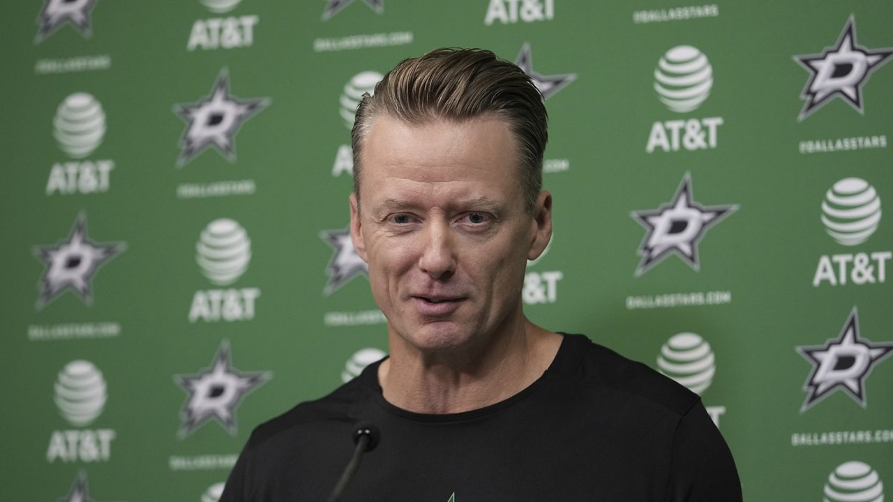 Dallas Stars head coach Glen Gulutzan responds to questions during a news conference at the NHL hockey team's headquarters, Wednesday, Sept. 17, 2025, in Frisco, Texas. (AP Photo/Tony Gutierrez)