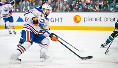 Jake Walman skates against the San Jose Sharks