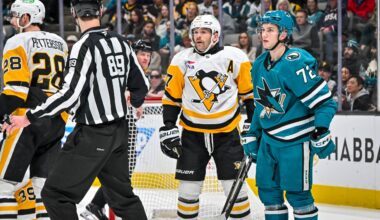 San Jose Sharks forward William Eklund stands next to Pittsburgh Penguins forward Bryan Rust
