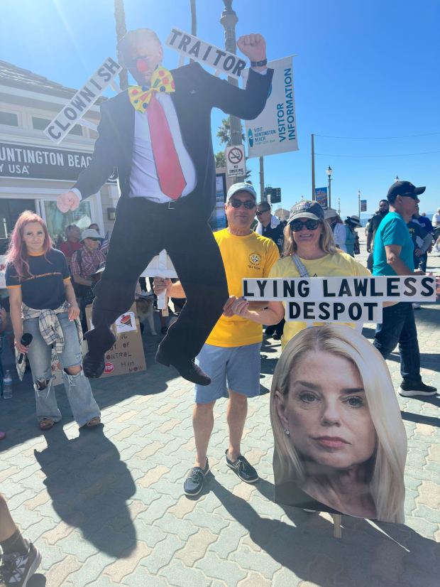 U.S. Attorney General Pam Bondi was the focus of a large cutout in Huntington Beach (Photo by Sydney Barragan)