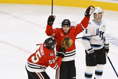 Oct 13, 2025; Chicago, Illinois, USA;  Chicago Blackhawks right wing Ilya Mikheyev (95) celebrates with Chicago Blackhawks defenseman Artyom Levshunov (55) after he scores a goal against Utah Mammoth goaltender Vitek Vanecek (41) during the second period at United Center. 