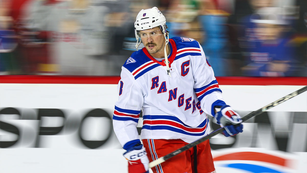 New York Rangers center J.T. Miller (8) skates during the warmup period against the Calgary Flames at Scotiabank Saddledome.