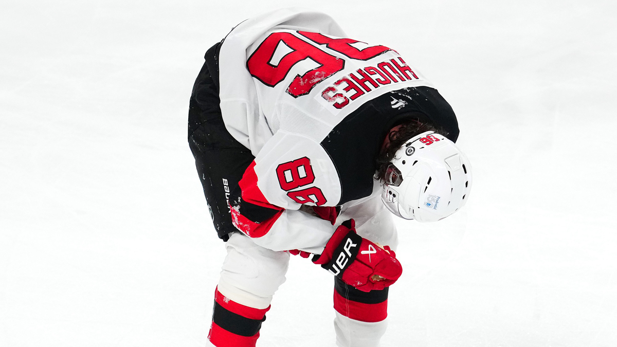 New Jersey Devils center Jack Hughes (86) makes his way off the ice after sustaining an apparent injury during a play against the Vegas Golden Knights during the third period at T-Mobile Arena.