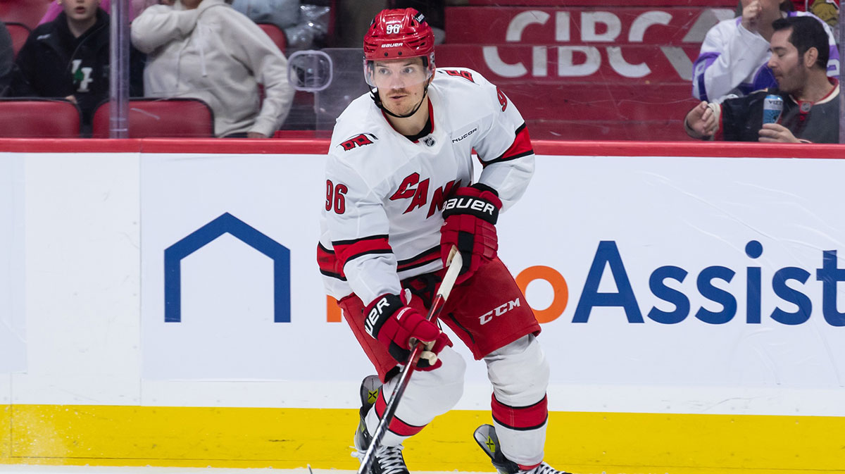 Carolina Hurricanes center Jack Roslovic (96) skates with the puck in the second period against the Ottawa Senators at the Canadian Tire Centre.