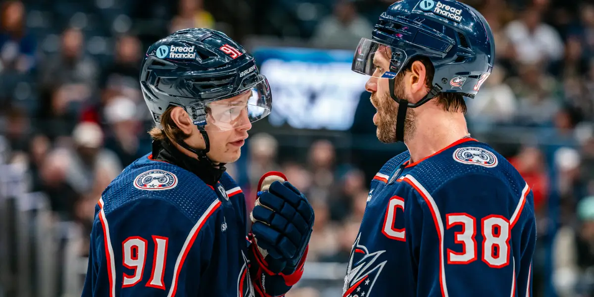 Blue Jacket's Kent Johnson having a word with Captain Boone Jenner