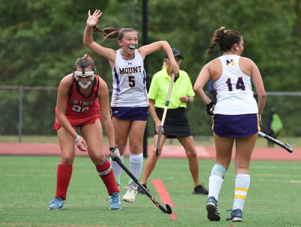 Mount Saint Joseph's Raegan Walsh, 5, celebrates after a goal by Nora Masella, 14, gave the Magic a 5-4 lead over Gwynedd Mercy in the third quarter of their game on Wednesday, Sept. 24, 2025. Mount Saint Joseph won 6-4. (Mike Cabrey/MediaNews Group)
