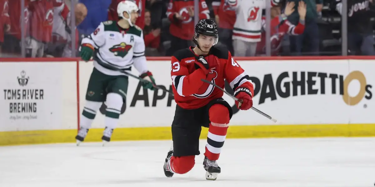 New Jersey Devils defenseman Luke Hughes celebrates a first-period goal against the Minnesota Wild.