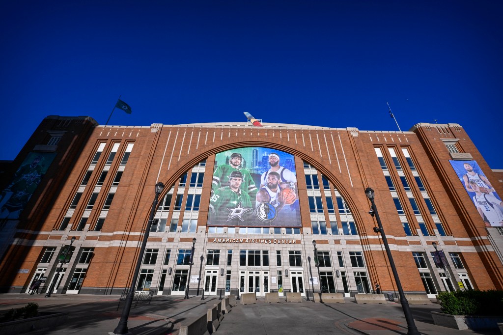 An exterior view of the arena with the banner images of Dallas Stars right wing Mikko Rantanen and Stars defenseman Miro Heiskanen and Dallas Mavericks guard Kyrie Irving and Mavericks forward Anthony Davis and before the game between the Stars and the Washington Capitals at the American Airlines Center.