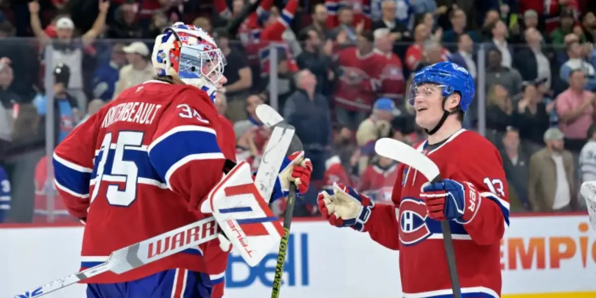 Samuel Montembault and Cole Caufield celebrating a Montreal Canadiens victory