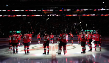New Jersey Devils salute the fans in the home opener at the Prudential Center on Thursday night.