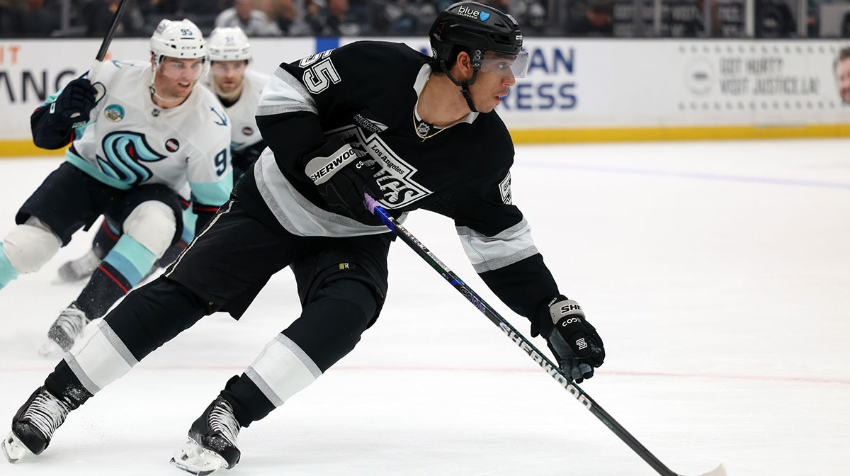 Los Angeles Kings right wing Quinton Byfield (55) skates with the puck during the third period against the Seattle Kraken at Crypto.com Arena.