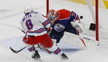 New York Rangers defenseman Braden Schneider (4) collides with goal Igor Shesterkin (31) in the first period against the Toronto Maple Leafs at Scotiabank Arena.