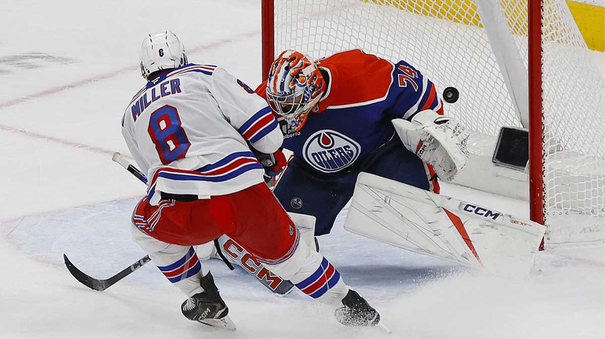 New York Rangers defenseman Braden Schneider (4) collides with goal Igor Shesterkin (31) in the first period against the Toronto Maple Leafs at Scotiabank Arena.