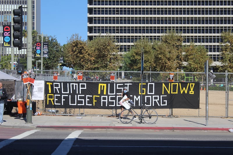 “Trump Must Go Now. RefuseFacism.org”