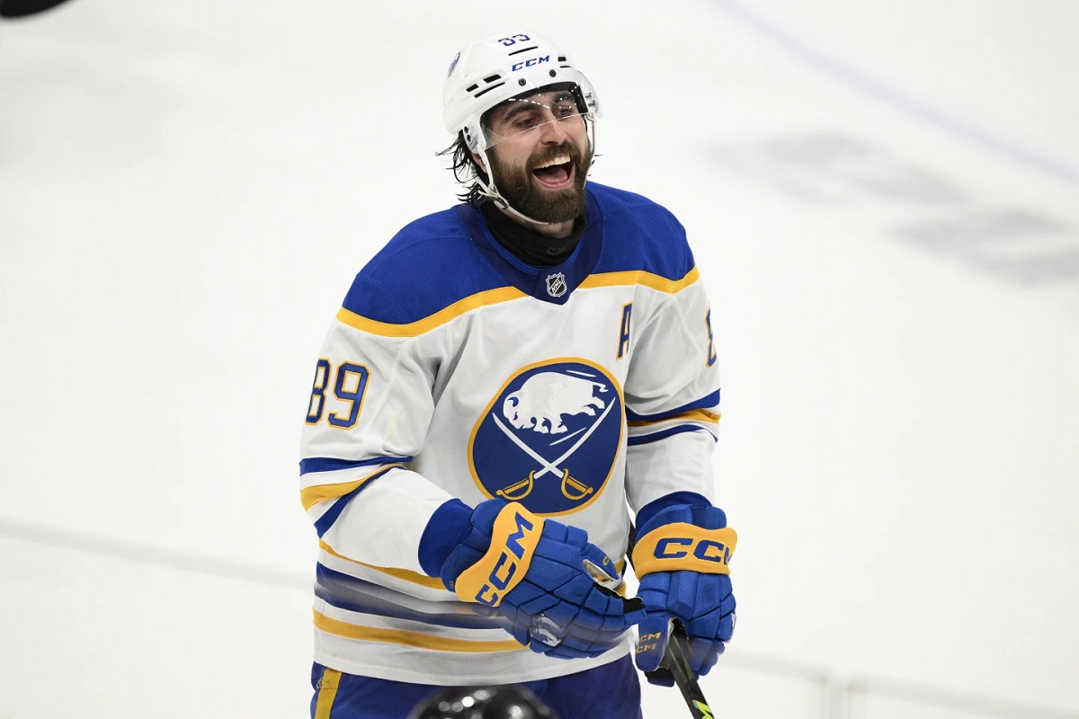 Buffalo Sabres right wing Alex Tuch celebrates after his goal during the third period of an NHL hockey game against the Washington Capitals, Sunday, March 30, 2025, in Washington. (AP Photo/Nick Wass) NHL