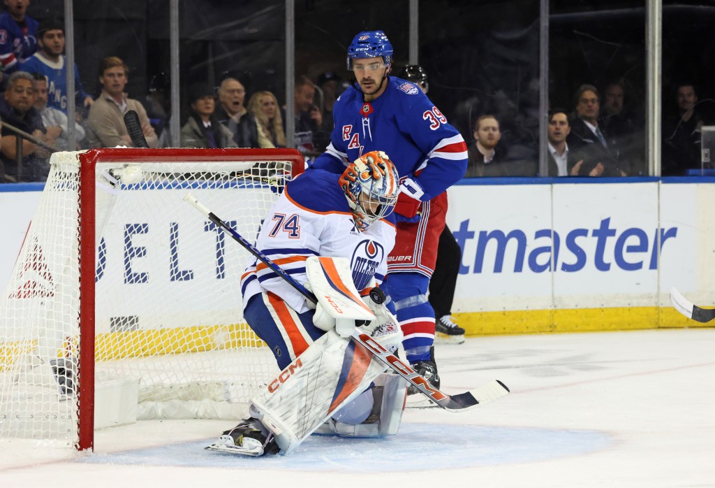 Sam Carrick, who was part of a strong Blueshirts' fourth line, looks on as Stuart Skinner makes a save during the third period of the Rangers' 2-0 loss to the Oilers on Oct. 14, 2025.