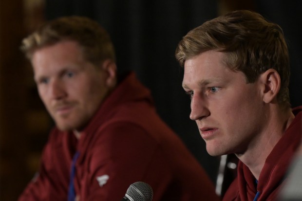 Colorado Avalanche Nathan MacKinnon, right, and Gabriel Landeskog answer questions from reporters at Ball Arena in Denver on Wednesday, Sept. 17, 2025. (Photo by Hyoung Chang/The Denver Post)