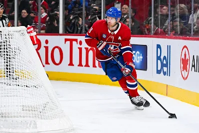 Mike Matheson, Montreal Canadiens defenseman Mike Matheson, Montreal Canadiens defenseman skates with the puck behind the net