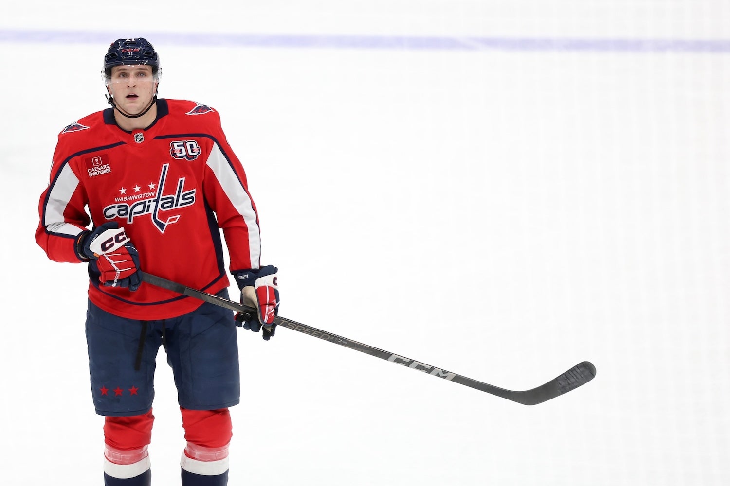 Apr 4, 2025; Washington, District of Columbia, USA; Washington Capitals center Aliaksei Protas (21) watches the puck during the first period against the Chicago Blackhawks at Capital One Arena. Mandatory Credit: Amber Searls-Imagn Images