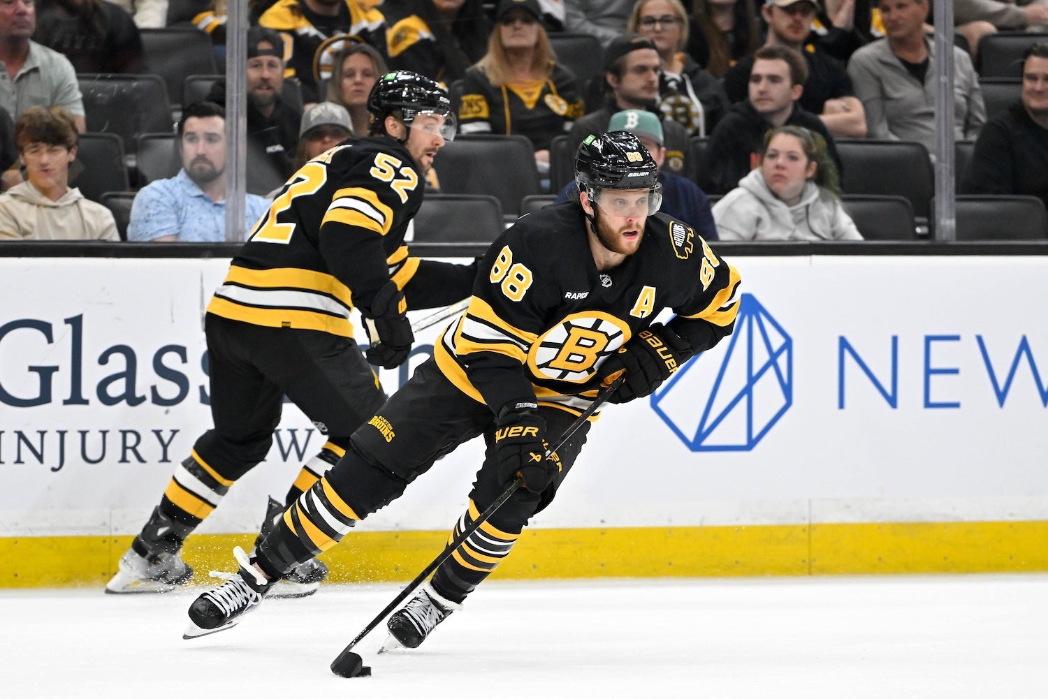 Sep 29, 2025; Boston, Massachusetts, USA; Boston Bruins right wing David Pastrnak (88) takes the puck up the ice during the second period against the Philadelphia Flyers at TD Garden. Mandatory Credit: Eric Canha-Imagn Images