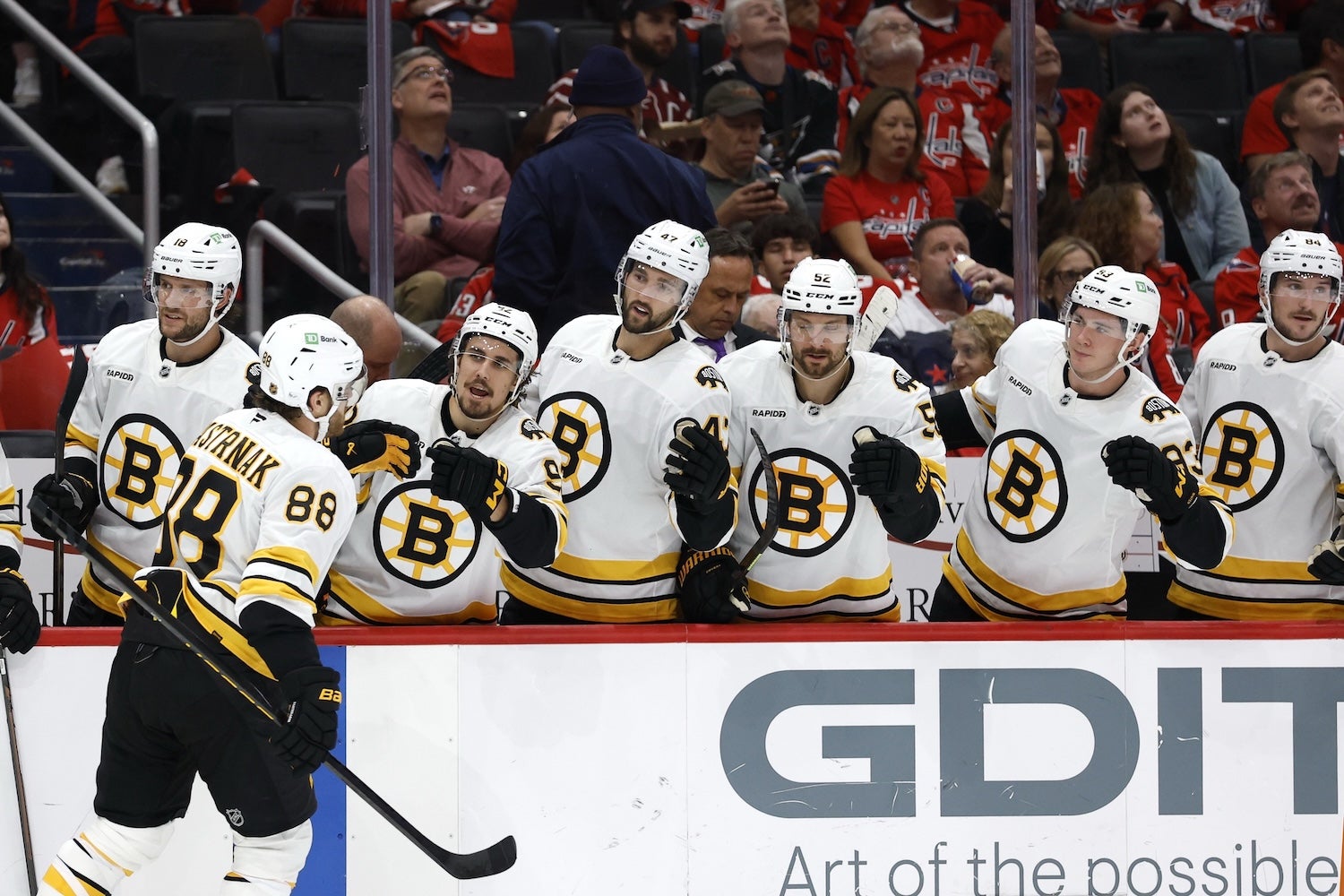Oct 8, 2025; Washington, District of Columbia, USA; Boston Bruins right wing David Pastrnak (88) celebrates with teammates after scoring a goal against the Washington Capitals during the second period at Capital One Arena. Mandatory Credit: Geoff Burke-Imagn Images