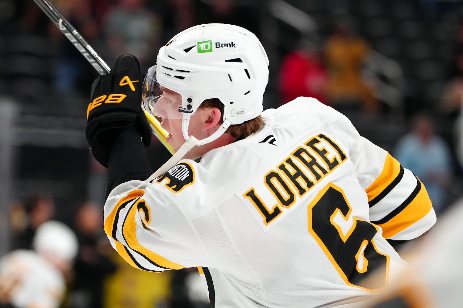 Oct 16, 2025; Las Vegas, Nevada, USA; Boston Bruins defenseman Mason Lohrei (6) warms up before a game against the Vegas Golden Knights at T-Mobile Arena. Mandatory Credit: Stephen R. Sylvanie-Imagn Images