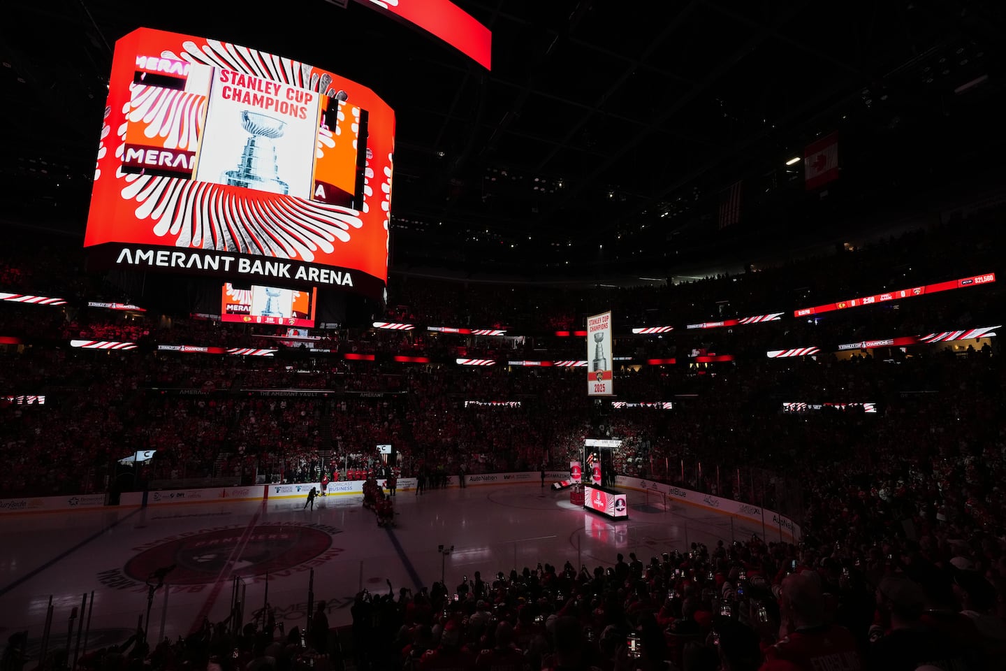 The Panthers' 2025 Stanley Cup banner is raised to the Amerant Bank Arena rafters ahead of Tuesday's season opener against the Blackhawks.
