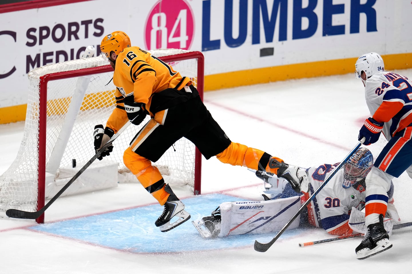 Justin Brazeau gets the puck behind Islanders goaltender Ilya Sorokin in a win on Thursday.
