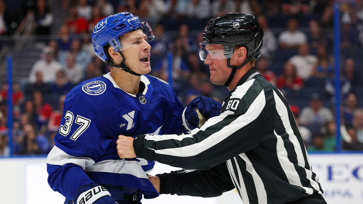 Florida Panthers center Eetu Luostarinen (27) pushes Tampa Bay Lightning defenseman J.J. Moser (90) down to the ice in the third period at Benchmark International Arena.
