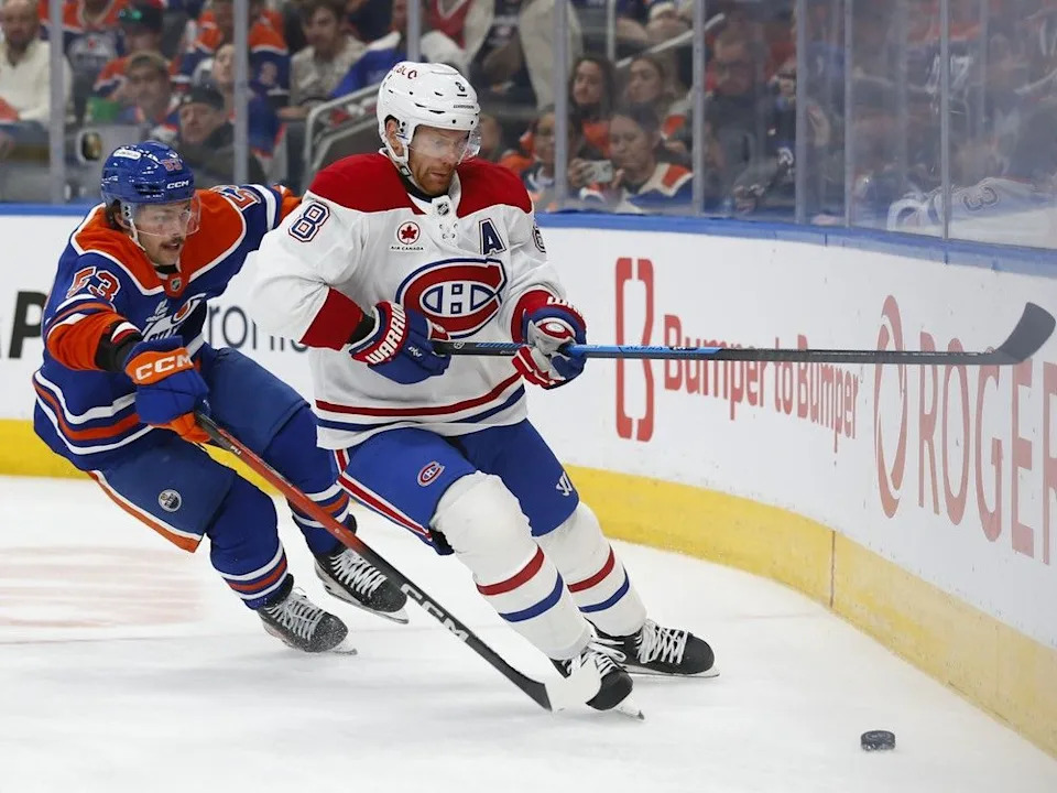  Canadiens’ Mike Matheson (8) skates against Oilers’ Isaac Howard at Rogers Place on Thursday, Oct. 23, 2025, in Edmonton.
