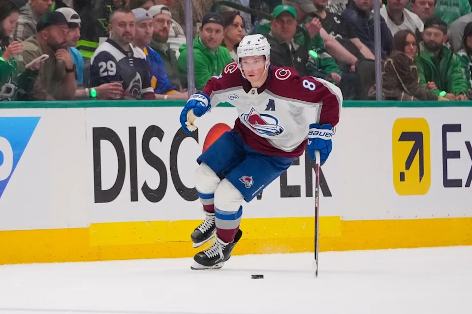 Avalanche defenseman Cale Makar (8) skates with the puck against the Dallas Stars. AP