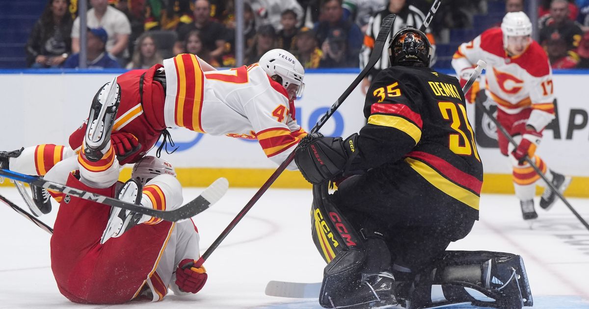 Filip Chytil scores twice as the Canucks open with a 5-1 victory over the Flames :: WRAL.com