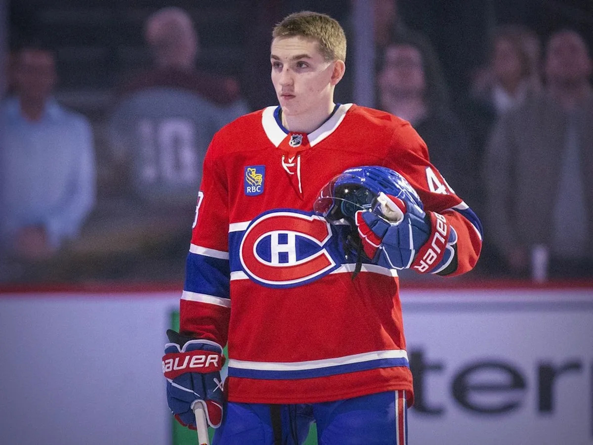 Teammates fête Lane Hutson after new deal