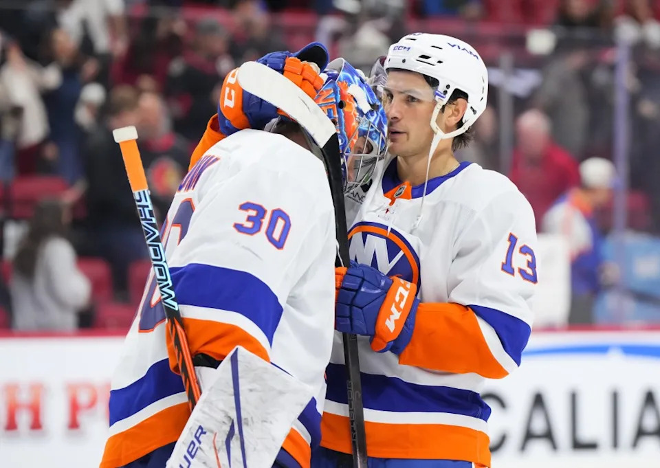 Ilya Sorokin celebrates with Mathew Barzal (right) after the Islanders’ road win over the Senators. NHLI via Getty Images