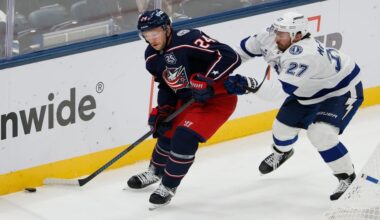 Columbus Blue Jackets' Mathieu Olivier, left, controls the puck as Tampa Bay Lightning's Ryan McDonagh defends during the second period of an NHL hockey game Saturday, Oct. 18, 2025, in Columbus, Ohio. (AP Photo/Jay LaPrete)