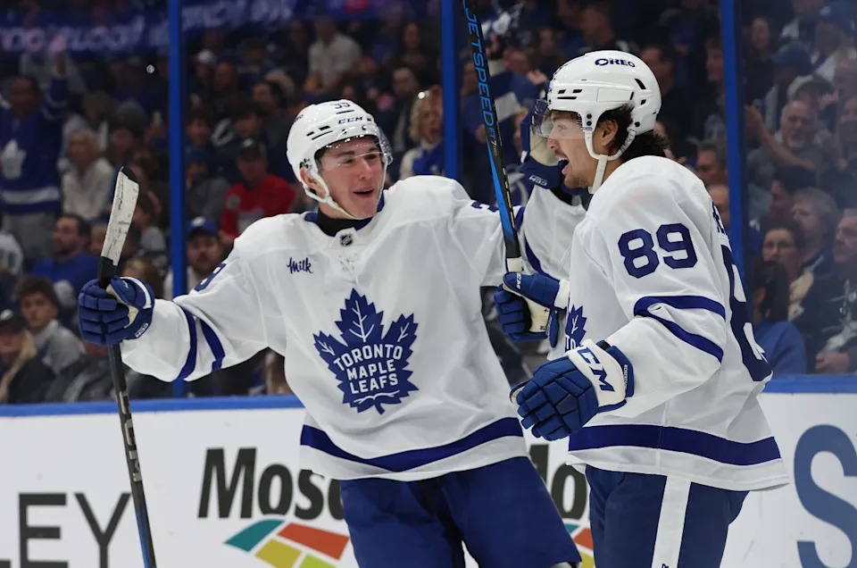 Toronto Maple Leafs left wing Nicholas Robertson (89) celebrates with a teammate.Kim Klement Neitzel-Imagn Images