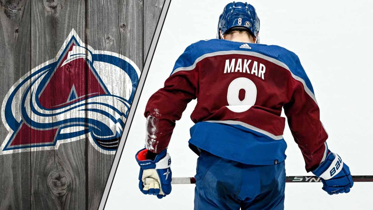Colorado Avalanche defenseman Cale Makar skates with the puck during an NHL game, poised to make a play.