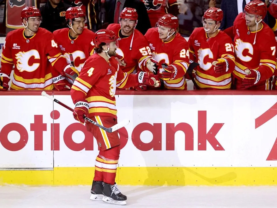  Calgary Flames defenceman Rasmus Andersson celebrates his shootout goal on Winnipeg Jets goalie Connor Hellebuyck in preseason NHL action at the Scotiabank Saddledome in Calgary on Friday, Oct. 3, 2025.