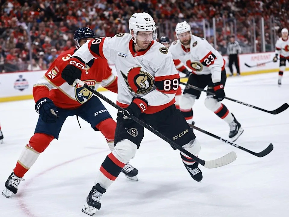  Lars Eller of the Senators chases the puck against the Panthers during the first period of Saturday’s game at Sunrise, Fla.