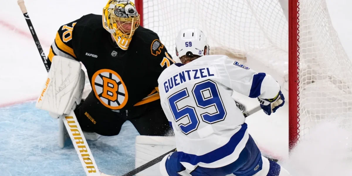 Jake Guentzel and Jonas Korpisalo battle at the net. Boston Bruins vs. Tampa Bay Lightning 10/13/2025