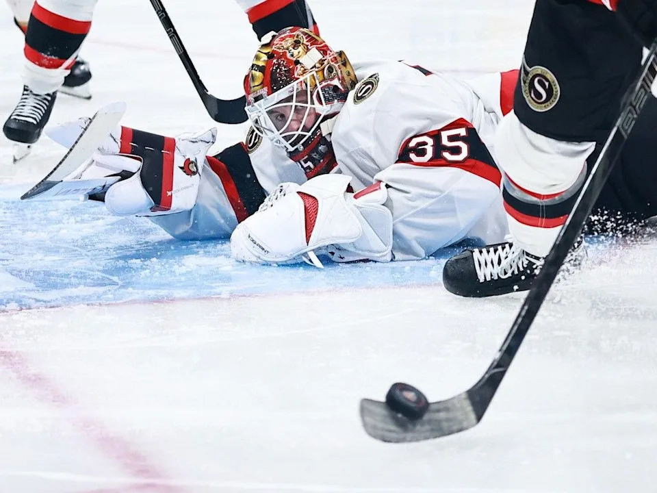  Senators netminder Linus Ullmark dives to make a save against the Panthers during the second period on Saturday night.