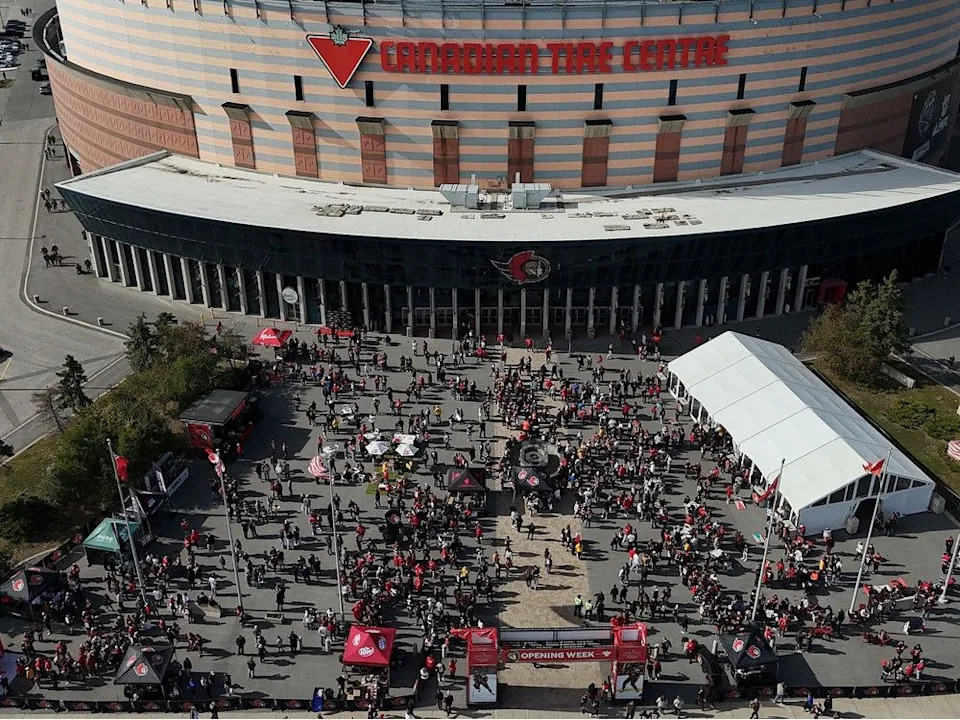  Sens fans enjoying the nice weather outside the Canadian Tire Centre before the home opener Monday.